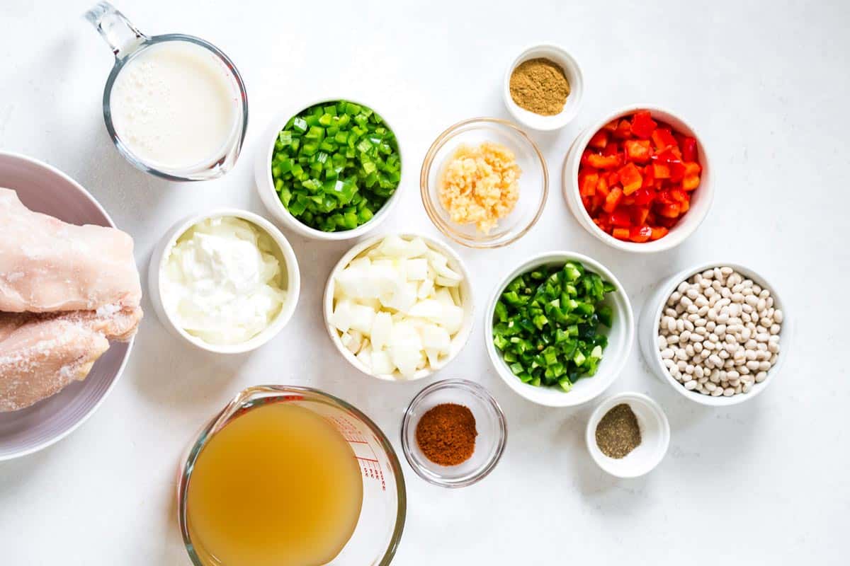 ingredients in small bowls measured out to make White Chicken Chili
