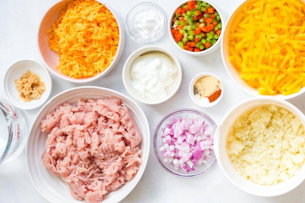 small bowls, on top of a white counter, all container ingredients needed to make recipe.