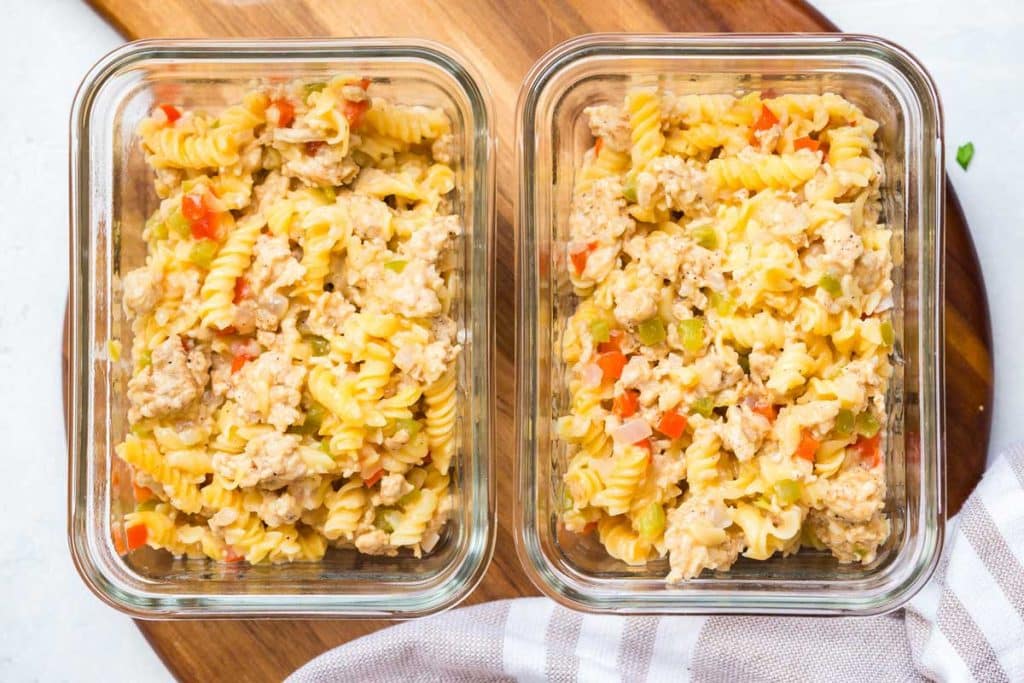 two glass meal prep containers full of Philly Cheesesteak Pasta