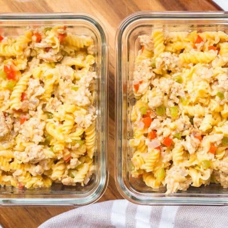 two glass meal prep containers full of Philly Cheesesteak Pasta