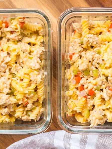 two glass meal prep containers full of Philly Cheesesteak Pasta