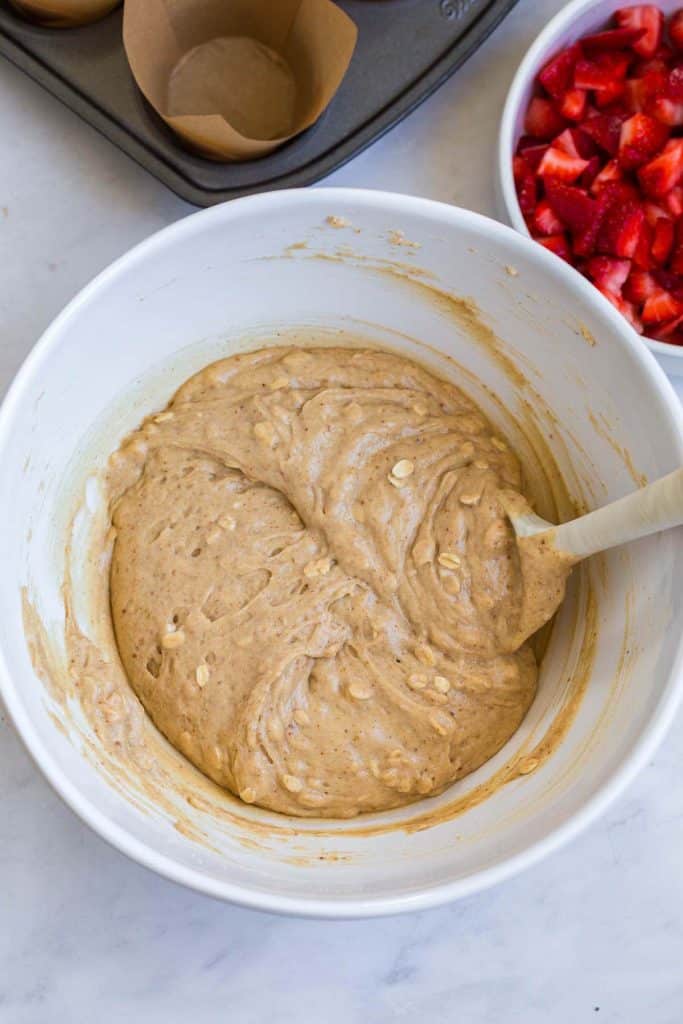 combined wet and dry ingredients in a white bowl