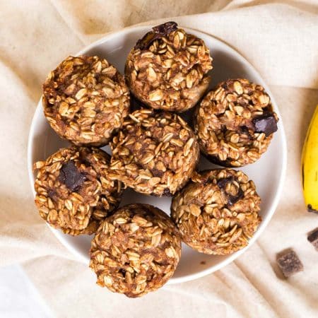 7 banana oatmeal bites on a white plate