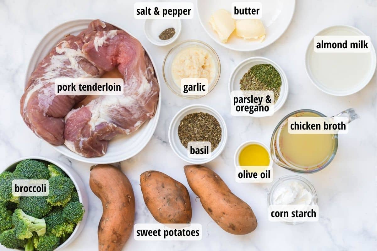 Marble countertop with labeled ingredients needed to make Instant Pot Garlic Pork Tenderloin with Sweet Potatoes.